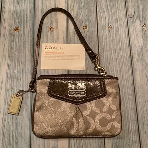 NWOT Coach signature gray/metallic wristlet